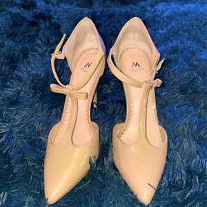 Classic Lady Tstrap Pointed Toe Heels.